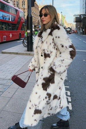cow fur coat long animal print fluffy overcoat for women side view Alicefurs