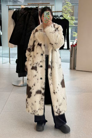 cow fur coat long animal print fluffy overcoat for women front view worn by model Alicefurs